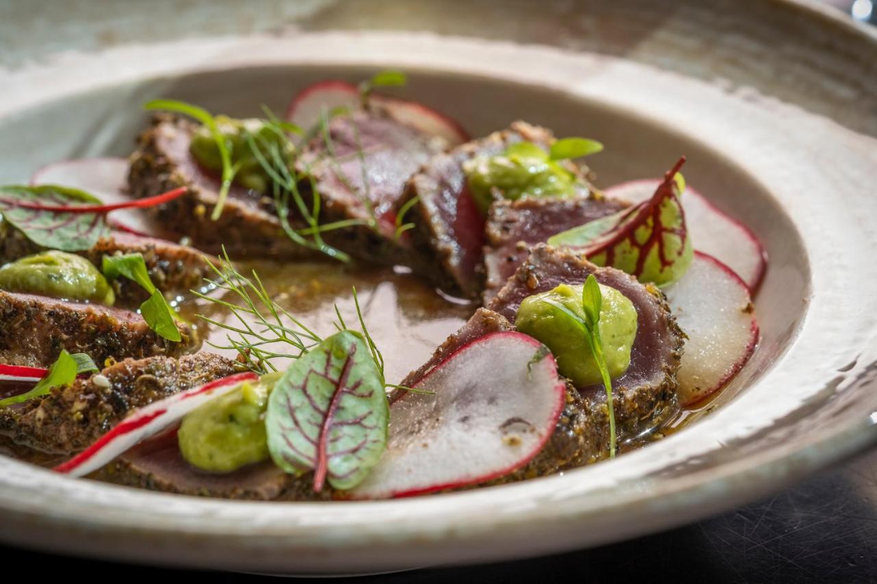 Kimpton Epic Hotel By Ihg Miami Exterior photo A dish of cured and smoked fish