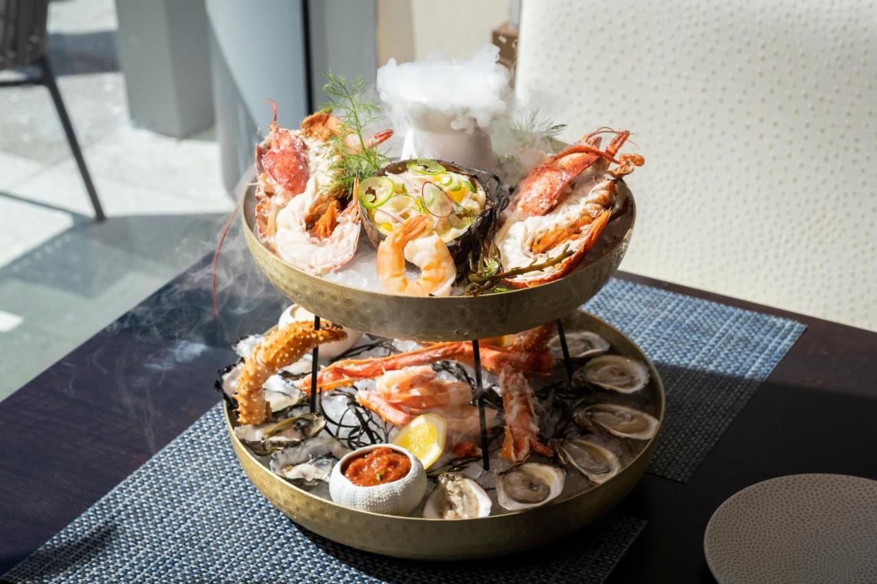 Kimpton Epic Hotel By Ihg Miami Exterior photo A seafood platter