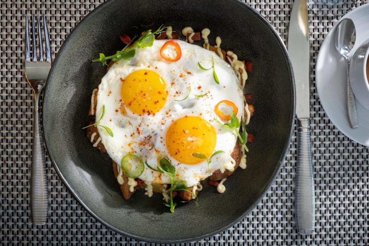 Kimpton Epic Hotel By Ihg Miami Exterior photo A plate of sunny side up eggs
